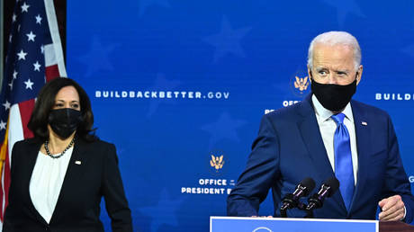 US President-elect Joe Biden, arrives with Vice-President-elect Kamala Harris to announces his economic team at The Queen Theater in Wilmington, Delaware, on December 1, 2020.