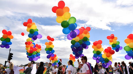 FILE PHOTO. People march during the annual Gay Pride parade in central Stockholm, Sweden.