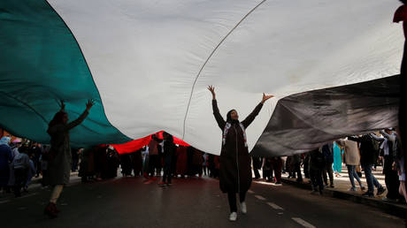 FILE PHOTO: Demonstrators take part in a protest against the U.S. President Donald Trump's Mideast peace plan, in Rabat, Morocco, February 9, 2020