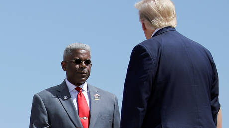 US President Donald Trump is greeted by Texas GOP Chairman Allen West in Midland, Texas, US, July 29, 2020