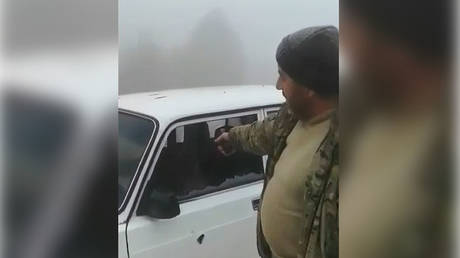 New Nagorno-Karabakh war crimes fears as Azerbaijani soldier boasts to camera about killing Armenian civilian & mutilating corpse