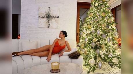 Christmas comes early for Cristiano! Georgina Rodriguez gets in festive mood as she poses in lingerie in front of tree (PHOTOS)