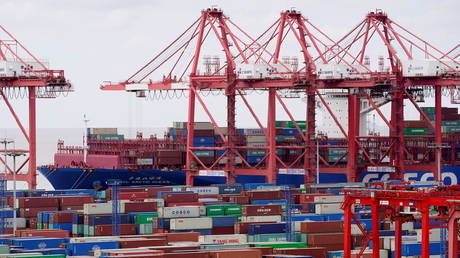 FILE PHOTO: Containers are seen at the Yangshan Deep Water Port in Shanghai, China.