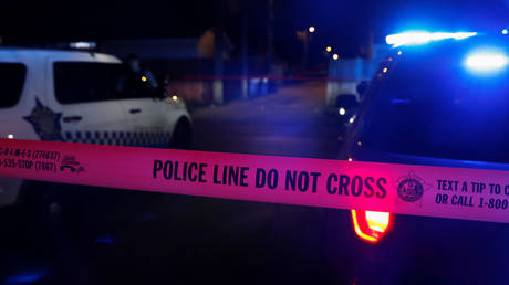 FILE PHOTO: Chicago police tape marks a crime scene in the South Side of Chicago, Illinois.