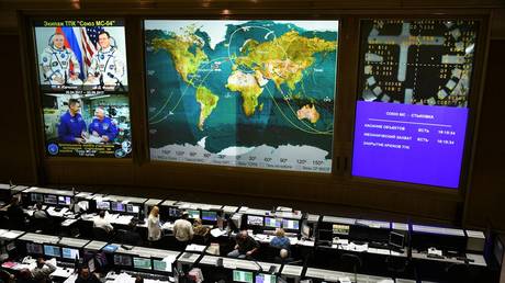 Employees of the mission control Center during the operation for launching into orbit, rendezvous and docking of the Soyuz MS-04 spacecraft with the ISS.
