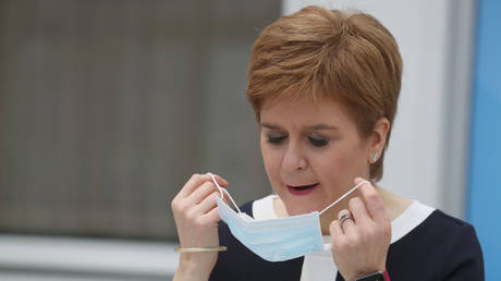 &lsquo;I&rsquo;m kicking myself and I&rsquo;m sorry&rsquo;: Scotland leader Sturgeon apologises after maskless photo in pub