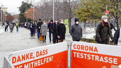 FILE PHOTO. People queue before a mass testing on the coronavirus disease in Vienna, Austria.