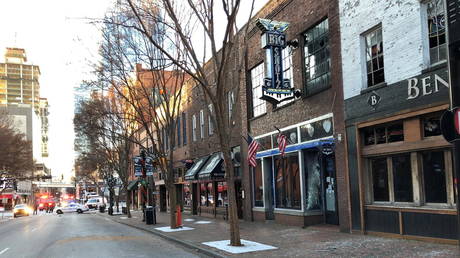 Buildings with windows blown out are shown near the site of a Christmas Day explosion in downtown Nashville.