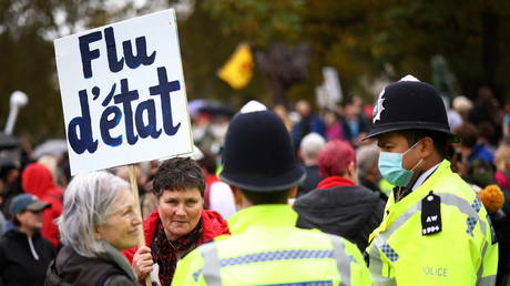 FILE PHOTO: Protesters take part in a march against coronavirus lockdown restrictions, in London, Britain.