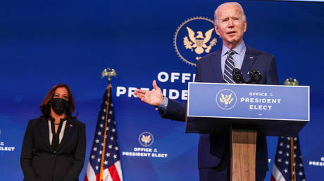 Joe Biden and Kamala Harris speak after a foreign policy briefing at his headquarters in Wilmington, Delaware, December 28, 2020.