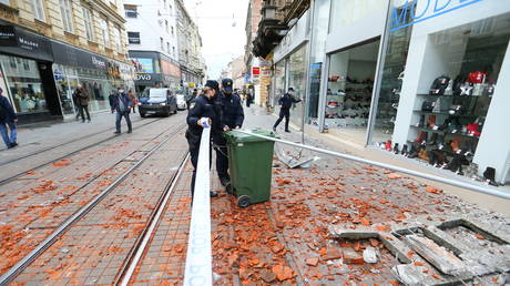 Police officers secure the area after an earthquake, in Zagreb, Croatia December 29, 2020.