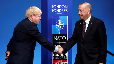 Britain's Prime Minister Boris Johnson shakes hands with Turkey's President Recep Tayyip Erdogan, December 4, 2019