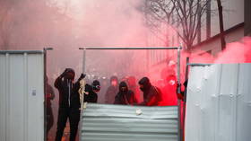Dozens arrested and 8 officers injured in violent Paris protests - French interior minister