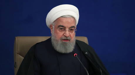 FILE PHOTO: Iranian President Hassan Rouhani speaks during a news conference in Tehran, Iran December 14, 2020.