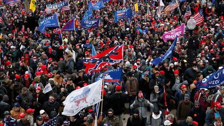 Pro-Trump protesters clash with Capitol police during a rally to contest the certification of the 2020 presidential election results, at the US Capitol Building in Washington, DC January 6, 2021.