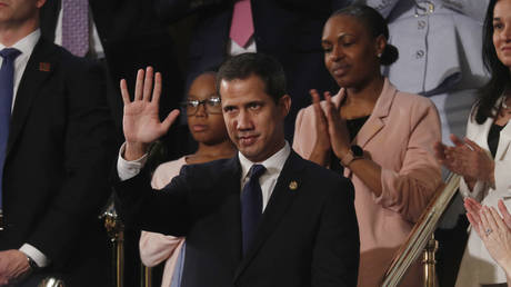 FILE PHOTO: Juan Guaido waves as US President Donald Trump delivers his State of the Union address on February 4, 2020. © REUTERS / Leah Millis