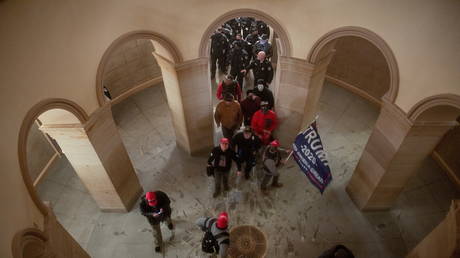 Supporters of US President Donald Trump enter the US Capitol, January 6, 2021.