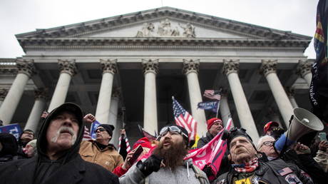 Pro-Trump protesters rally to contest the certification of the 2020 presidential election results at the US Capitol Building in Washington, DC, January 6, 2021.