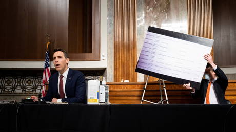 US Senator Josh Hawley of Missouri questions Mark Zuckerberg during the Senate Judiciary Committee hearing on "Breaking the News: Censorship, Suppression, and the 2020 Election", in Washington, US, November 17, 2020.