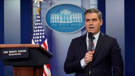 CNN's Jim Acosta is shown giving a report from the White House in 2018.