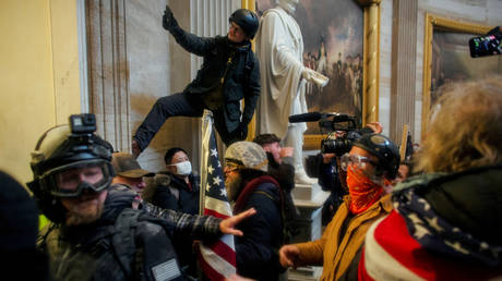 Protesters storm the Capitol Building in Washington, DC on January 6, 2021.