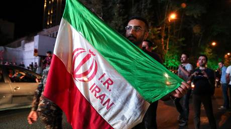 FILE PHOTO: Iranians celebrate the international agreement on the Iranian nuclear program in Tehran, July 2015. © Fatemeh Bahrami / Anadolu / Getty Images