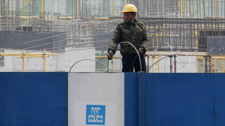 A worker is seen at a China State Construction Engineering Corporation's construction site. © Reuters / Kim Kyung-hoon
