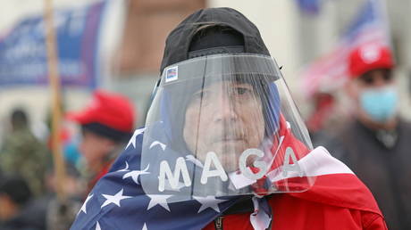 A supporter of Donald Trump pictured outside the US Capitol Building in Washington, DC, January 6, 2021 © Reuters / Leah Millis