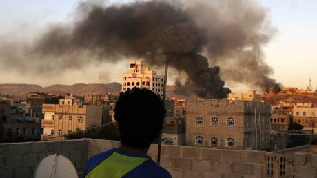 FILE PHOTO: Smoke rises over the Yemen government television building after the war crafts belonging to the Saudi-led coalition bombed there in Sanaa, Yemen on September 11, 2015