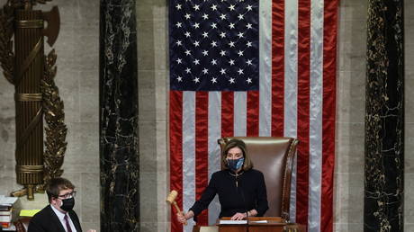 U.S. House Speaker Nancy Pelosi (D-CA) presides over the vote to impeach President Donald Trump for a second time on the floor of the House of Representatives in Washington January 13, 2021. © REUTERS/Jonathan Ernst