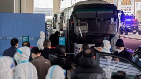 An expert team from the World Health Organization arrives in Wuhan, China, January 14, 2021. © AFP / Nicolas Asfouri