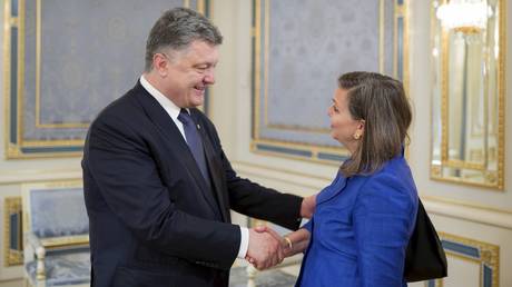 Victoria Nuland is shown greeting Ukrainian President Petro Poroshenko in 2015.