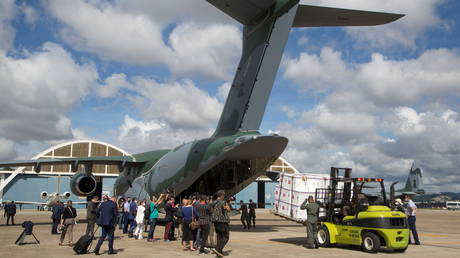 A Brazilian Air Force airplane is loaded with the Sinovac's vaccine in Sao Paulo, Brazil on January 18, 2021.