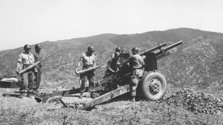 FILE PHOTO: Algerian War of Independence. Military operations with artillery against outlaws, in the mountains of Kabylia. May 1956.