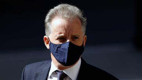 FILE PHOTO: Former British spy Christopher Steele arrives at the High Court in London, Britain, July 20, 2020