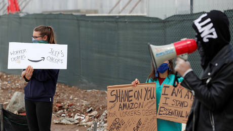 FILE PHOTO: Protesters rally outside of an Amazon warehouse