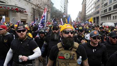 FILE PHOTO: Proud Boys members and other supporters of former US president Donald Trump attend a rally in Washington, DC, December 12, 2020.