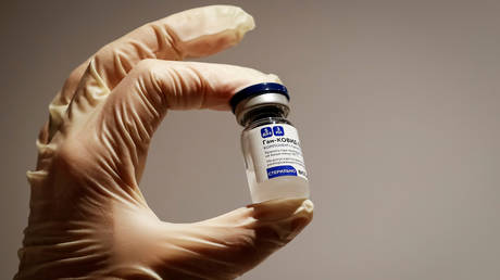 FILE PHOTO: A medical specialist holds a vial of Sputnik V vaccine against the coronavirus in a department store in Moscow, Russia.