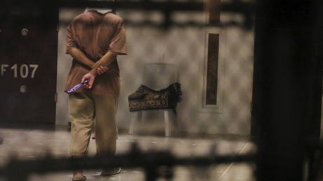 FILE PHOTO: A detainee paces around a cell block while being held in Joint Task Force Guantanamo's Camp VI at the U.S. Naval Base in Guantanamo Bay, Cuba March 22, 2016. © REUTERS/Lucas Jackson