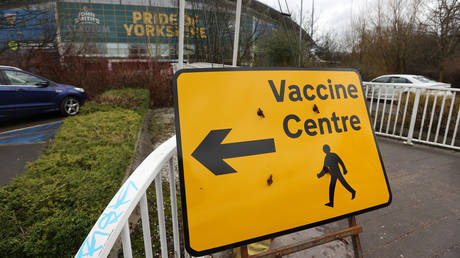 A Vaccine Centre sign outside the John Smith's Stadium, Huddersfield, Britain