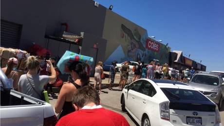 Shoppers line up outside Coles Supermarket during the COVID-19 pandemic in North Perth, Australia January 31, 2021 in this image obtained from social media. Twitch @Travisty_James via REUTERS