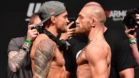 Hot sauce and staredowns: Watch Conor McGregor and Dustin Poirier go face-to-face for the last time ahead of UFC 257 (VIDEO)