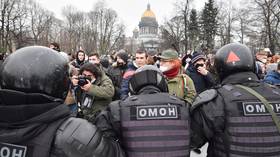 Woman kicked in stomach by riot cop during St. Petersburg protests backtracks on forgiveness of offender, says was confused