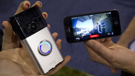 FILE PHOTO: A Ring video doorbell (L) is displayed during the 2015 International Consumer Electronics Show (CES) in Las Vegas, Nevada January 7, 2015