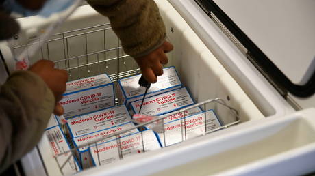 FILE PHOTO: A US army soldier moves a box containing the coronavirus disease (COVID-19) vaccines at Allgood Army Community Hospital located inside U.S. Army Garrison Humphreys in Pyeongtaek, South Korea, December 28, 2020.