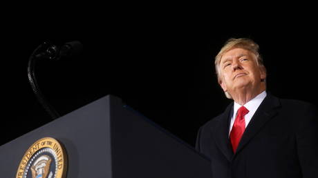 FILE PHOTO: Then-president Donald Trump addresses a campaign rally in Dalton, Georgia, January 4, 2021.