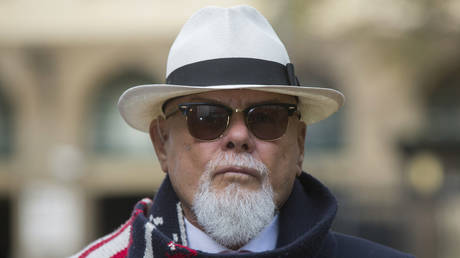 FILE PHOTO: Former British pop star Gary Glitter arrives at Southwark Crown Court in London November 11, 2014.