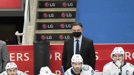 Vancouver Canucks head coach Travis Green watches the play during the third period against the Toronto Maple Leafs at Scotiabank Arena.