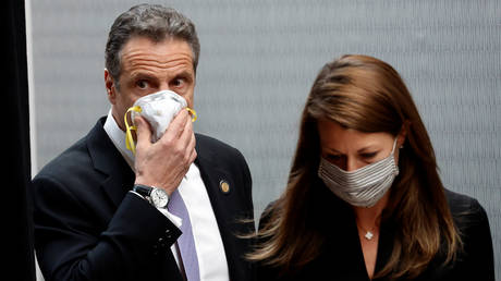 FILE PHOTO: New York Governor Andrew Cuomo and Secretary to the Governor Melissa DeRosa arrive for a daily coronavirus briefing at New York Medical College in Valhalla, New York.