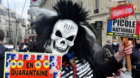 A person takes part in a demonstration against the so-called Global Security Bill, in Paris, France.© Sputnik